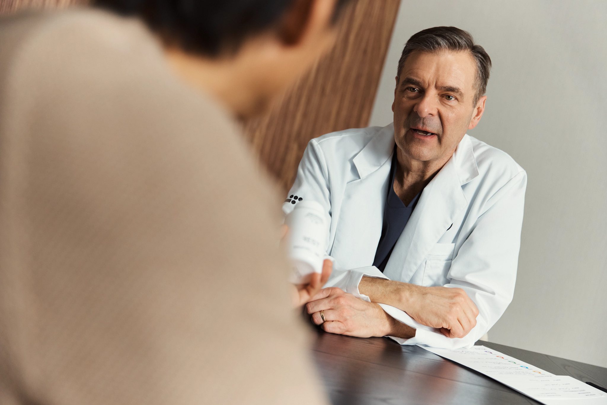 A doctor and patient in discussion during a MIORA consultation