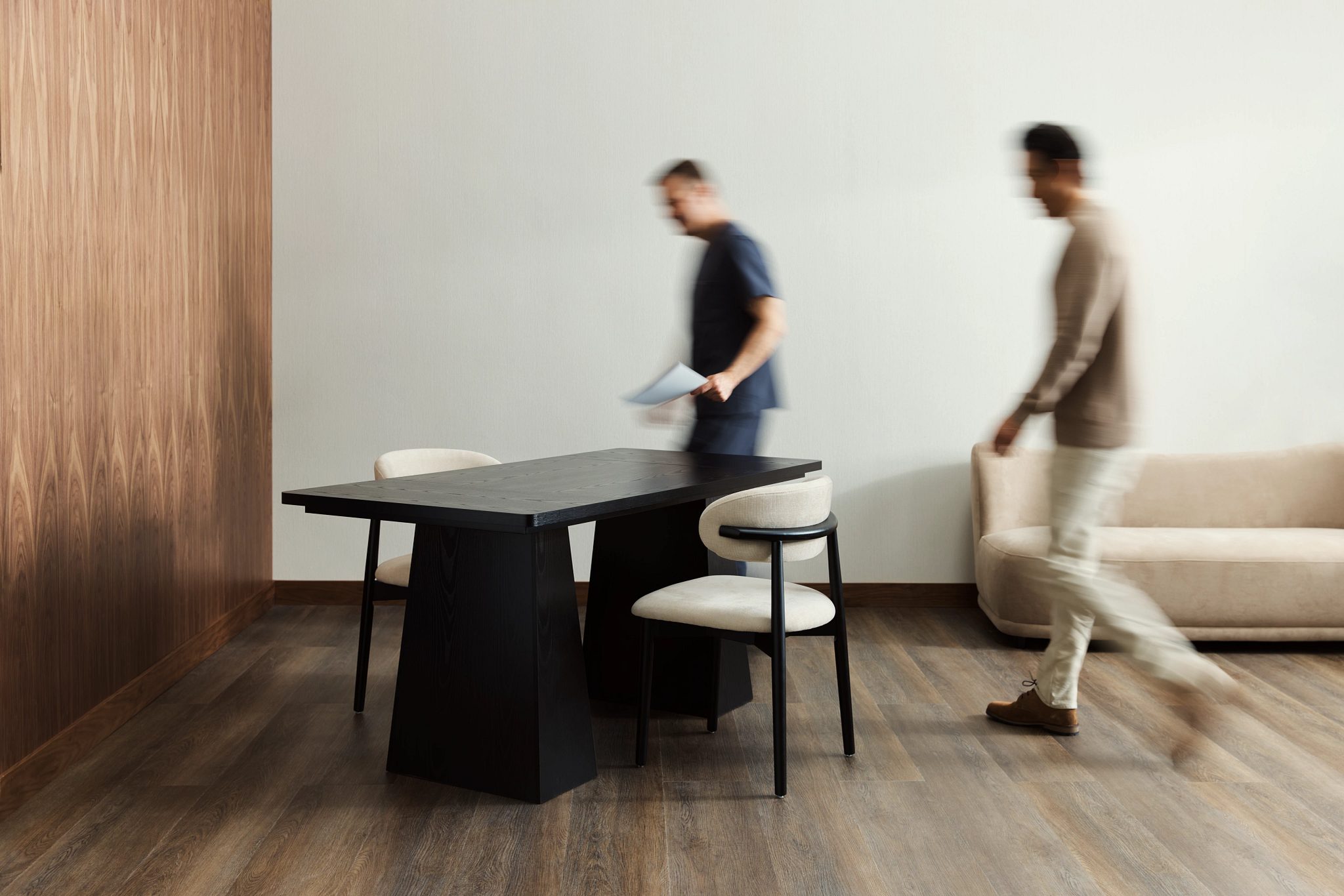 A doctor and patient walking into an office during a MIORA consultation